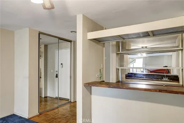 a view of a hallway with closet