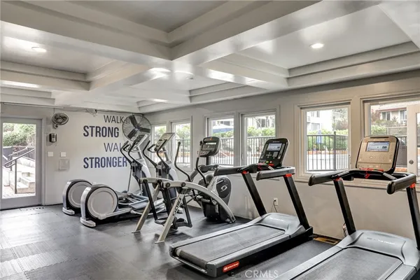 a kitchen with a cabinets and white appliances