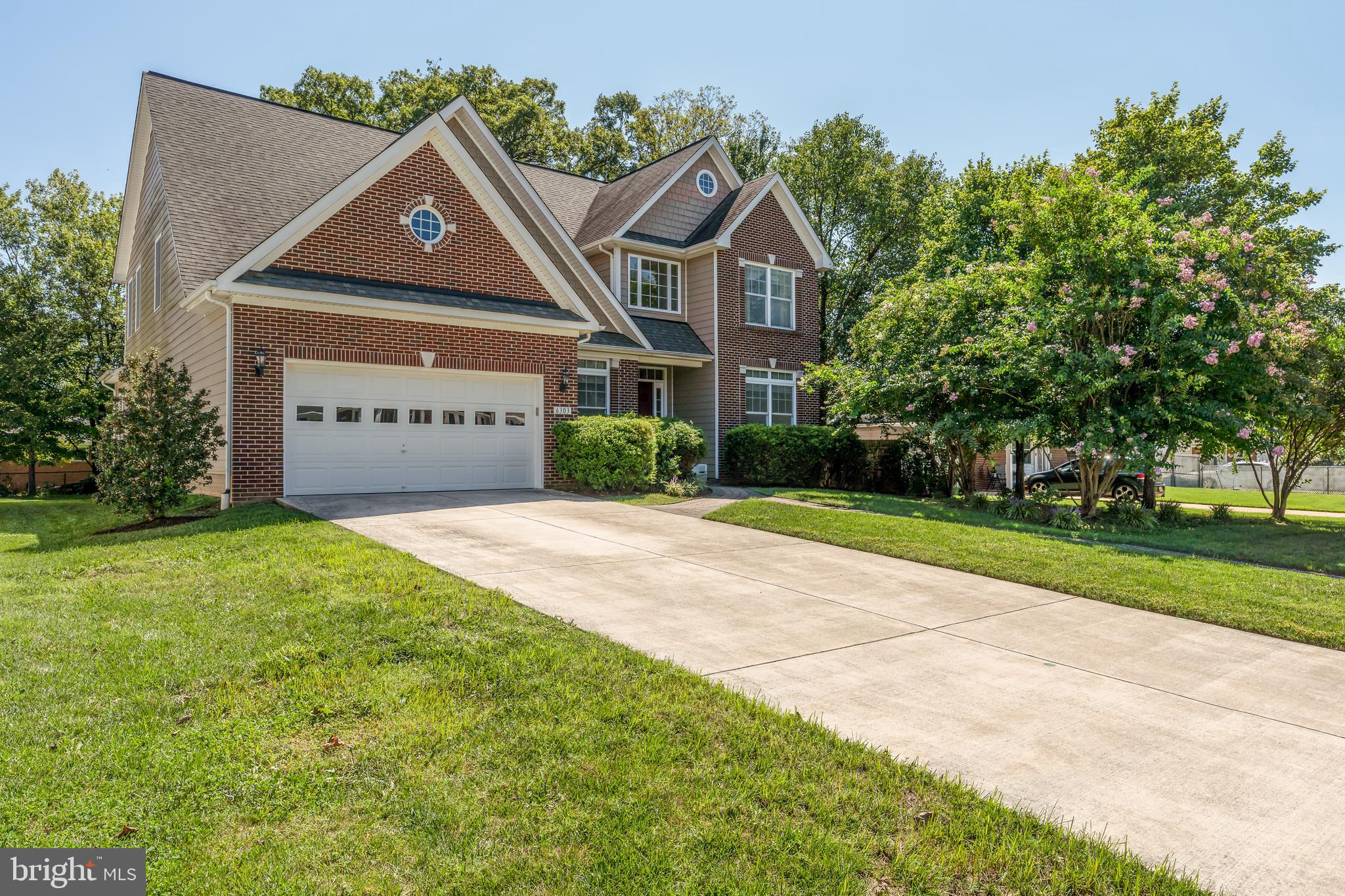 Mature landscaping of this custom home.