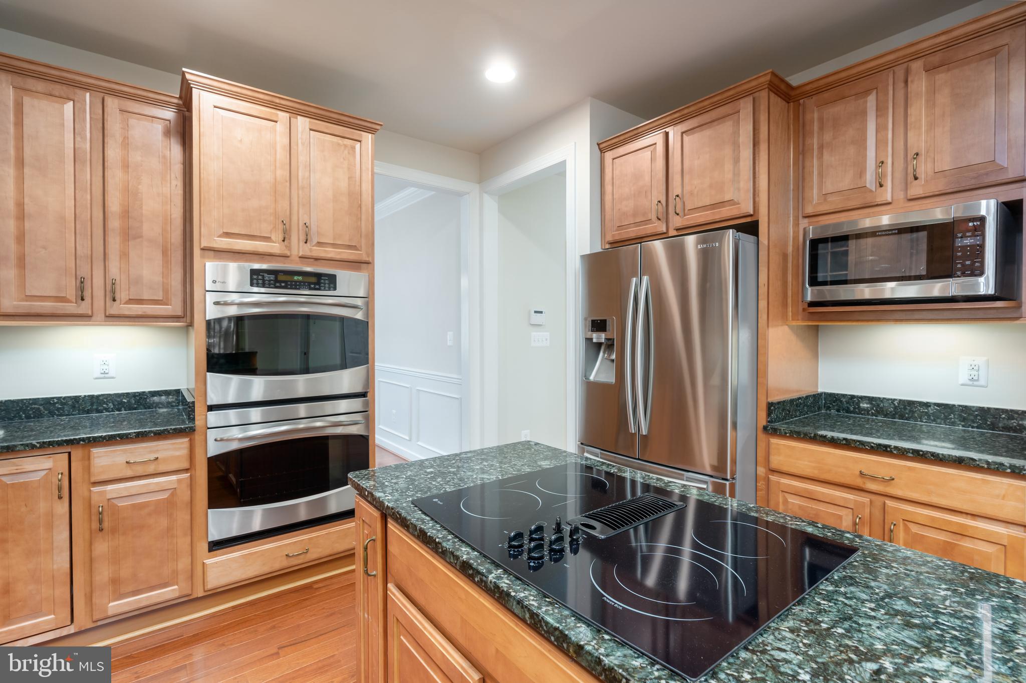 6303 Hanover Avenue Springfield, VA 22150 - Photo 14 of 29 Range top island; built in microwave.