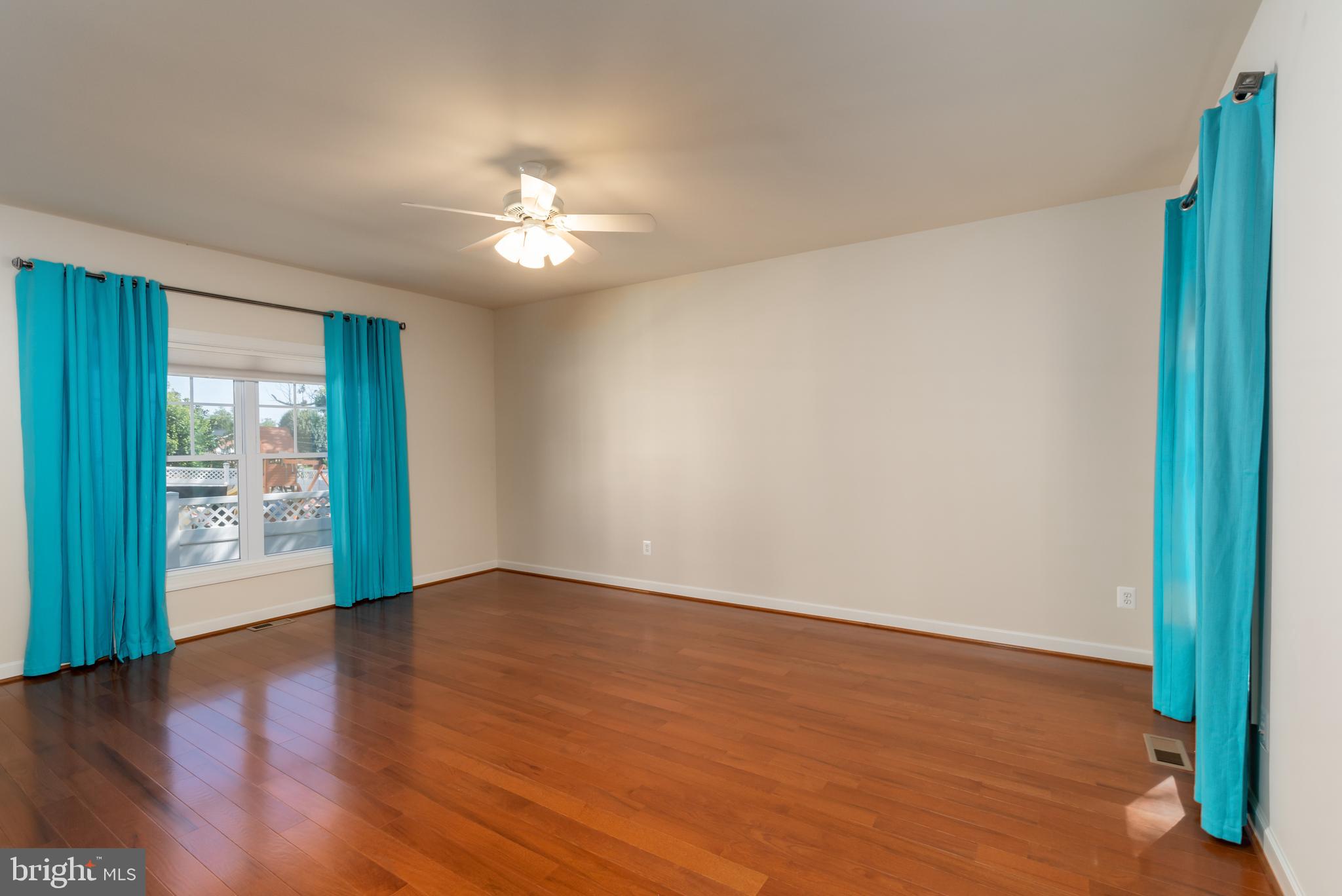 6303 Hanover Avenue Springfield, VA 22150 - Photo 18 of 29 First level master suite. Curtains convey.