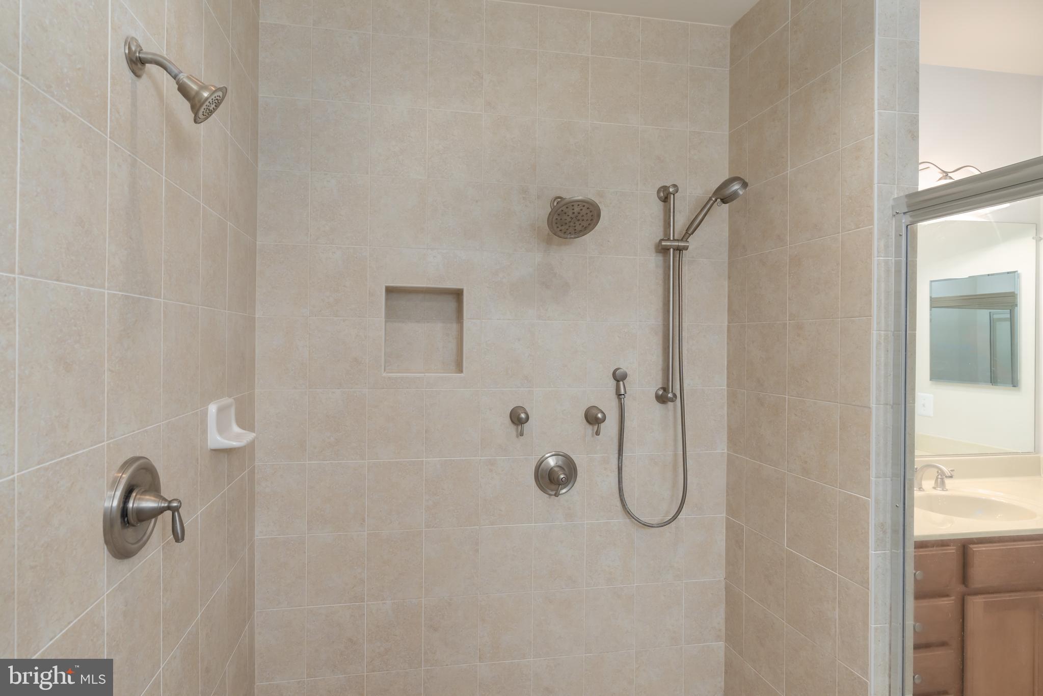6303 Hanover Avenue Springfield, VA 22150 - Photo 20 of 29 Multi-head walk-in master shower.