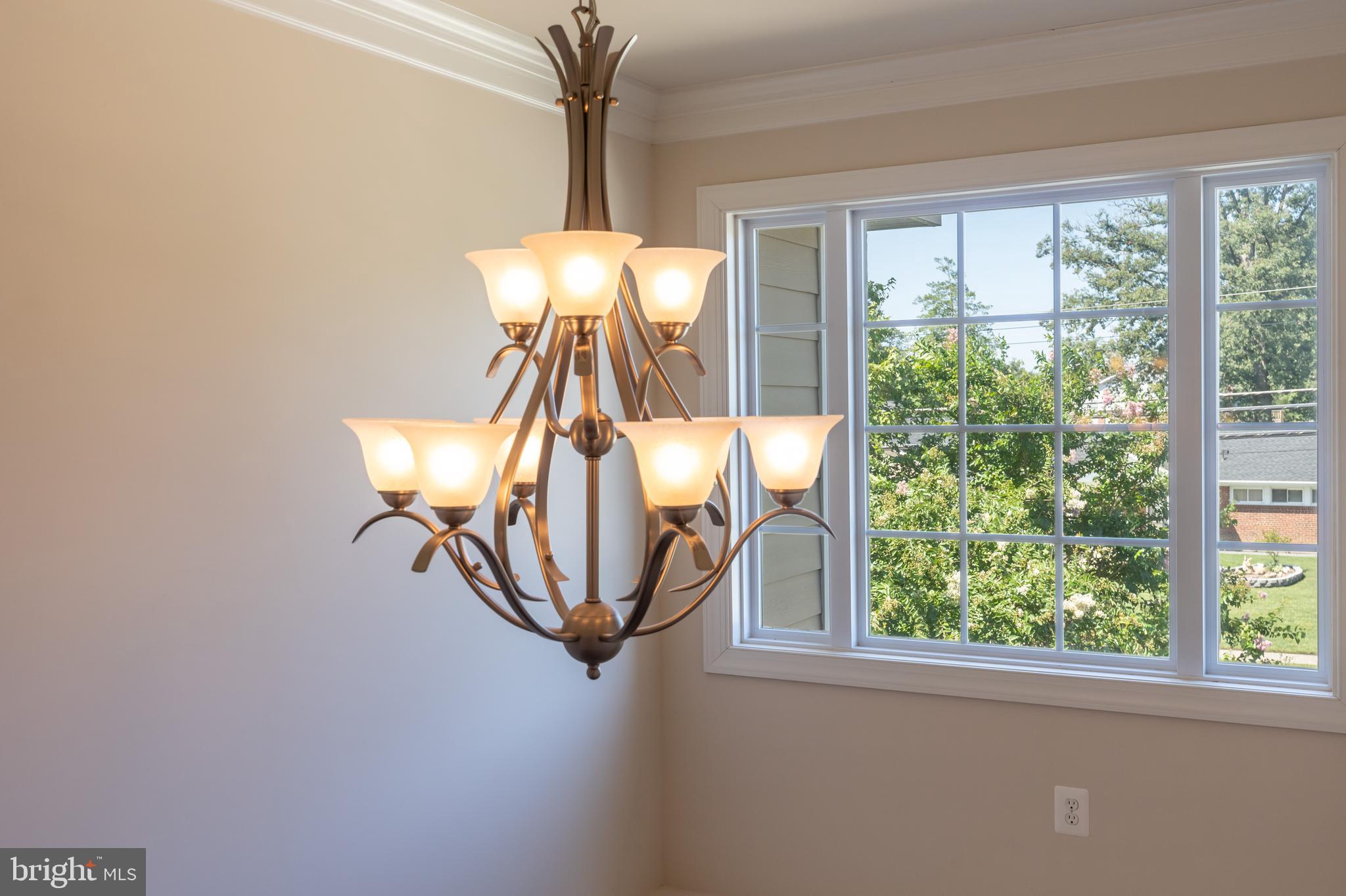 6303 Hanover Avenue Springfield, VA 22150 - Photo 8 of 29 Foyer chandelier and upper tier windows.
