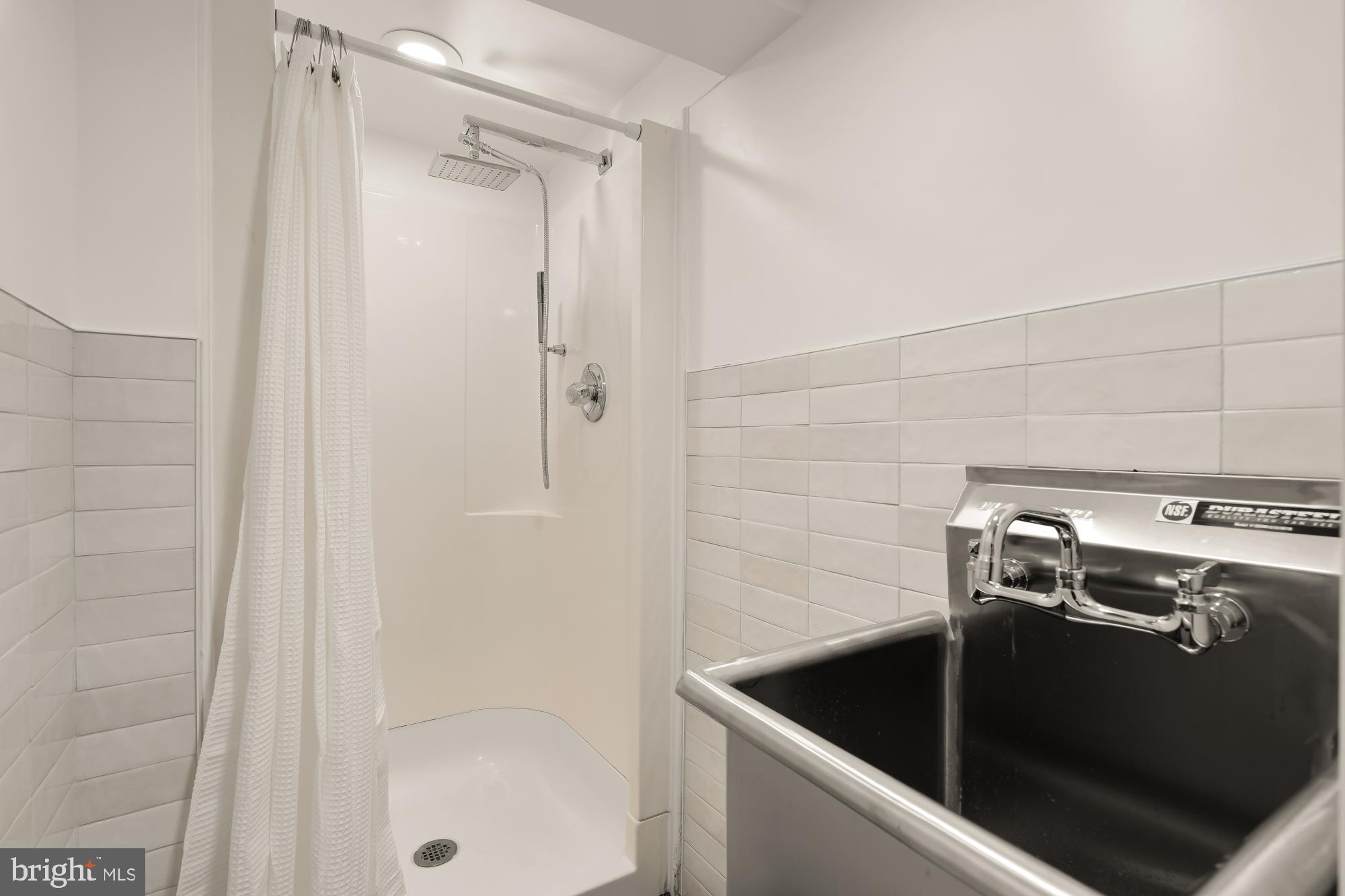 1819 Kenyon Street Northwest Washington, DC 20010 - Photo 56 of 74 Pet station or laundry sink