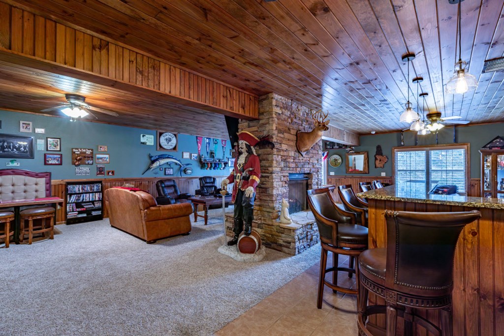 159 Apple Blossom Road Blairsville, GA 30512 - Photo 11 of 56 a room filled with furniture and a chandelier