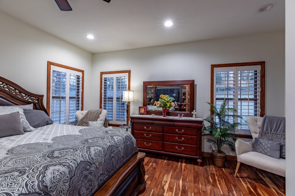 159 Apple Blossom Road Blairsville, GA 30512 - Photo 18 of 56 a bedroom with a bed and a couch