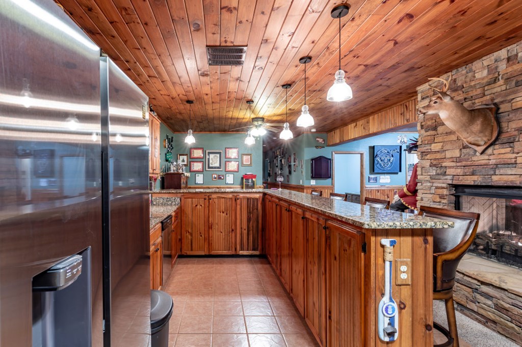 159 Apple Blossom Road Blairsville, GA 30512 - Photo 28 of 56 a kitchen with stainless steel appliances granite countertop a sink and cabinets