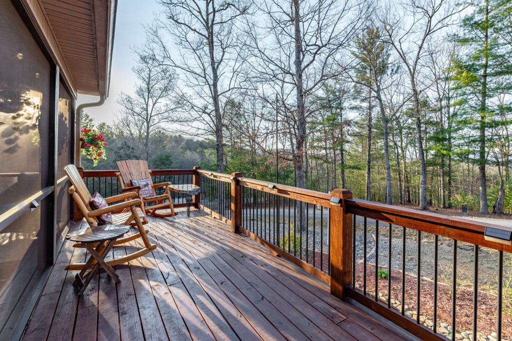 159 Apple Blossom Road Blairsville, GA 30512 - Photo 31 of 56 a view of balcony with wooden floor and outdoor seating