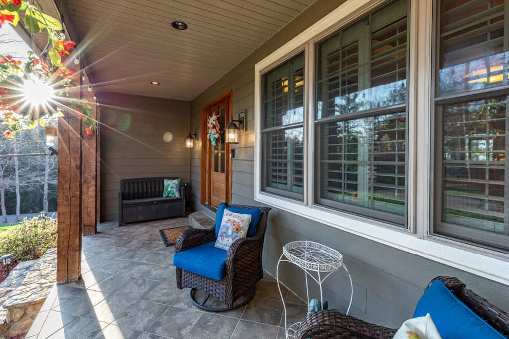 159 Apple Blossom Road Blairsville, GA 30512 - Photo 32 of 56 a outdoor living space with furniture and a fireplace