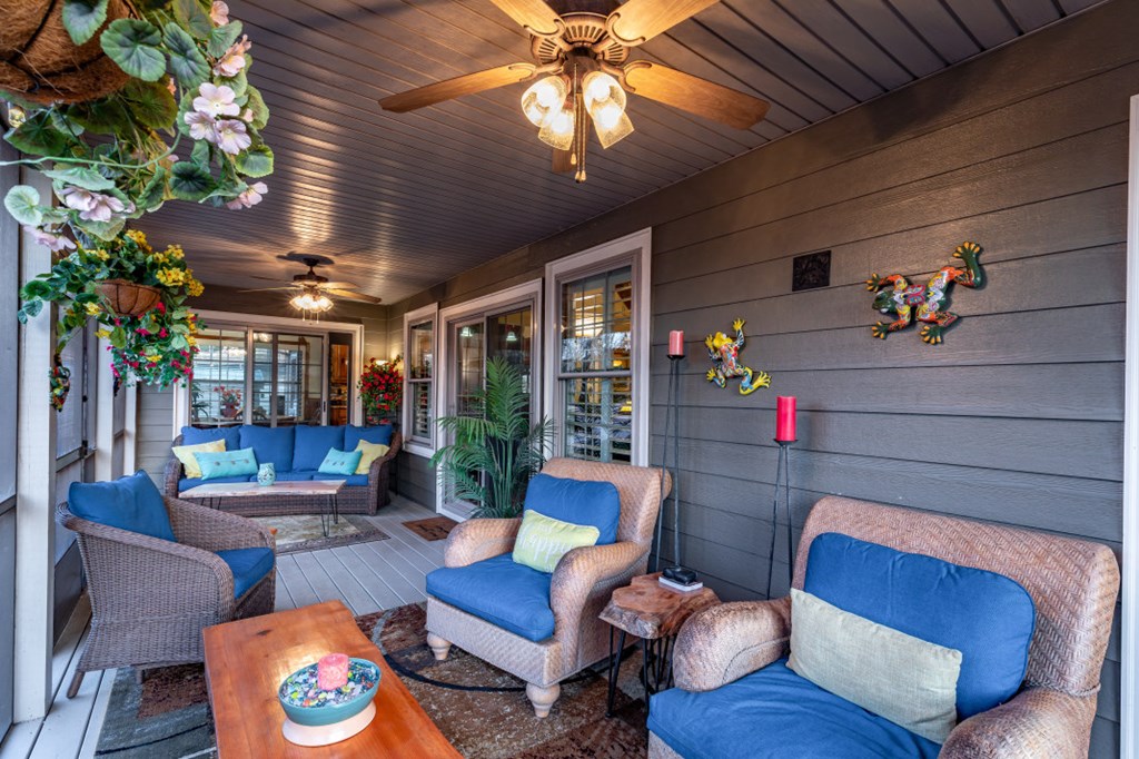 159 Apple Blossom Road Blairsville, GA 30512 - Photo 33 of 56 a living room with furniture and a chandelier