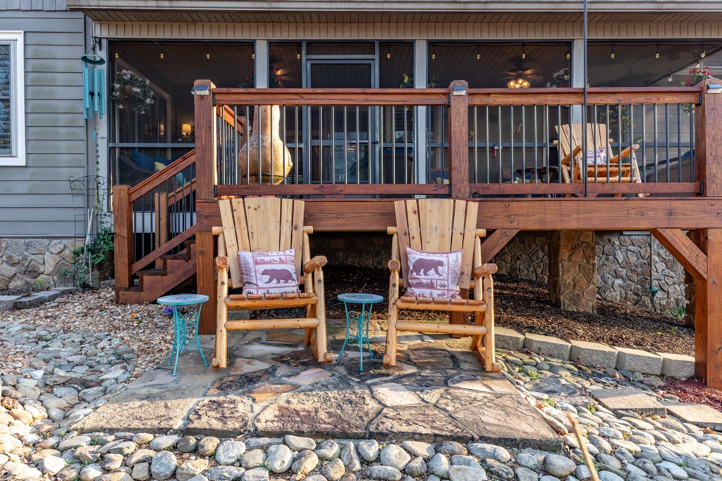 159 Apple Blossom Road Blairsville, GA 30512 - Photo 35 of 56 a view of a chair and table on the deck