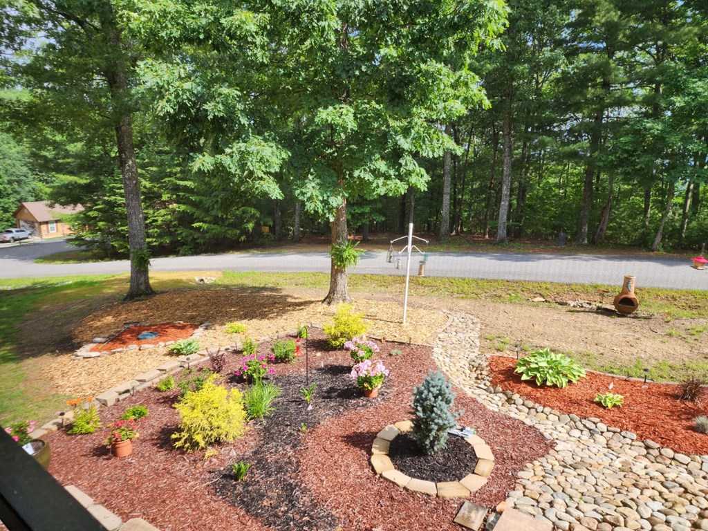 159 Apple Blossom Road Blairsville, GA 30512 - Photo 44 of 56 a view of a swimming pool and lounge chair
