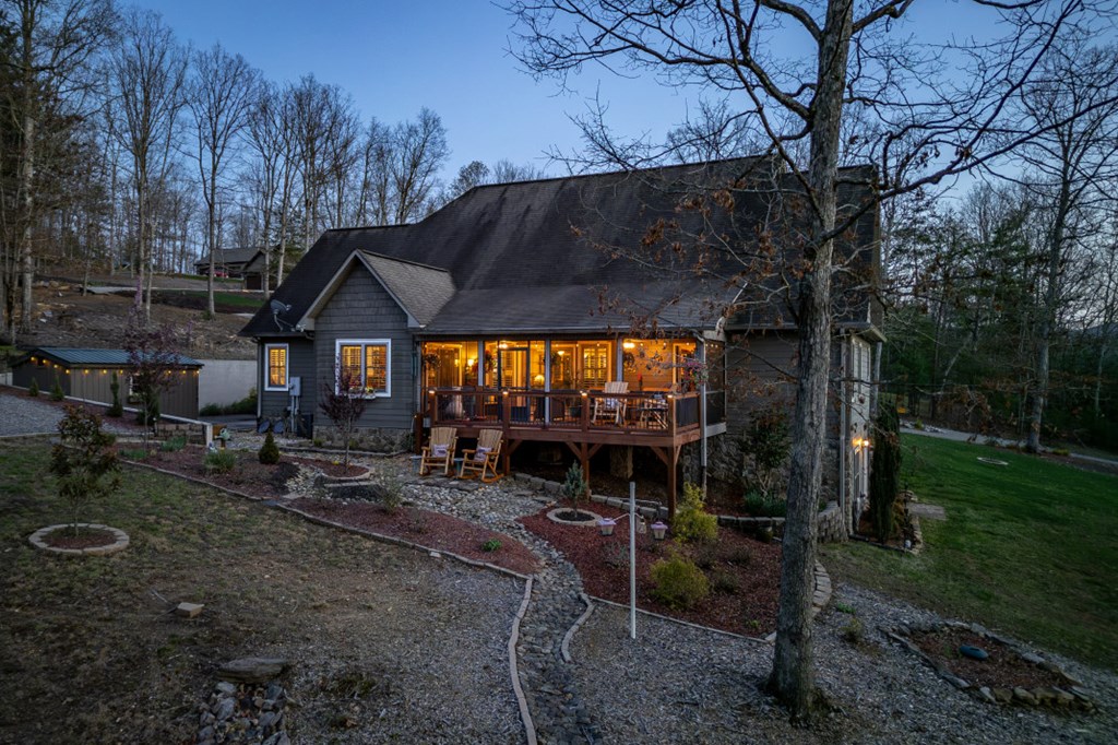 159 Apple Blossom Road Blairsville, GA 30512 - Photo 50 of 56 a backyard of a house with barbeque oven fire pit table and chairs