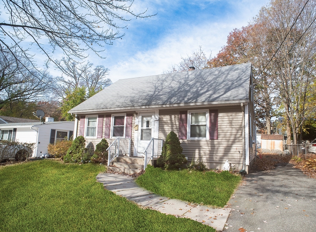 94 David Street Springfield, MA 01104 - Photo 2 of 11 a front view of a house with garden