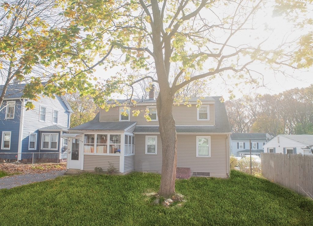 94 David Street Springfield, MA 01104 - Photo 3 of 11 a front view of a house with garden
