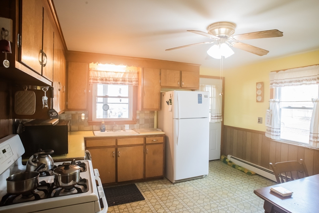 94 David Street Springfield, MA 01104 - Photo 7 of 11 a kitchen with a refrigerator and a sink