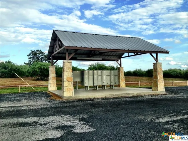 a view of a building with a sign board