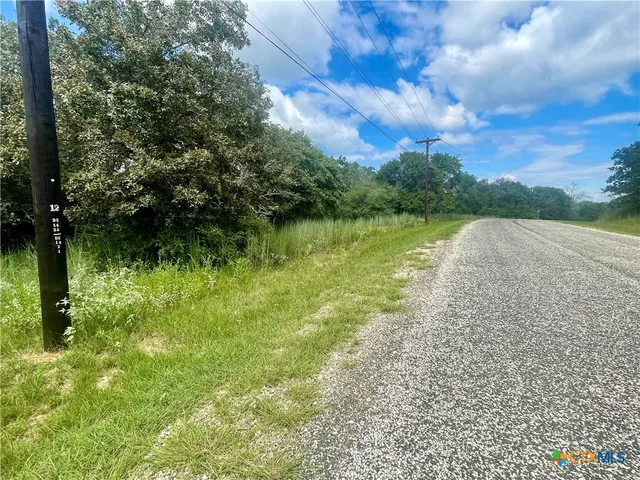 a view of a lake view with a garden