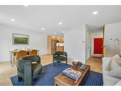 a living room with furniture and a couch