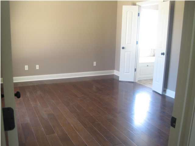 241 Greenfield Ridge Drive Brandon, MS 39042 - Photo 4 of 9 Wood in master bedroom