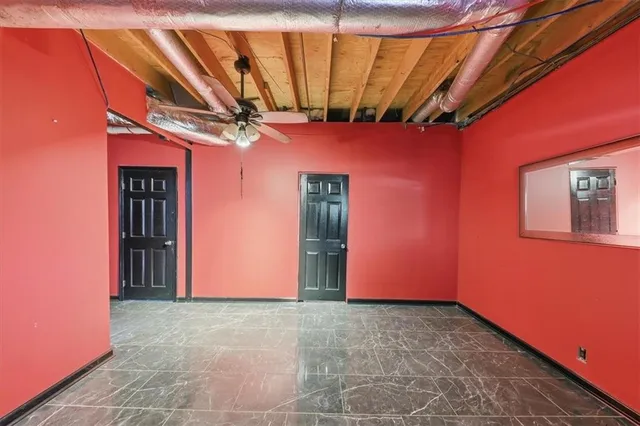 a picture of a room with wooden floor