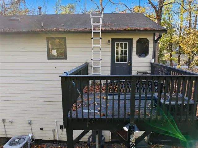 a view of swimming pool with outdoor seating and plants