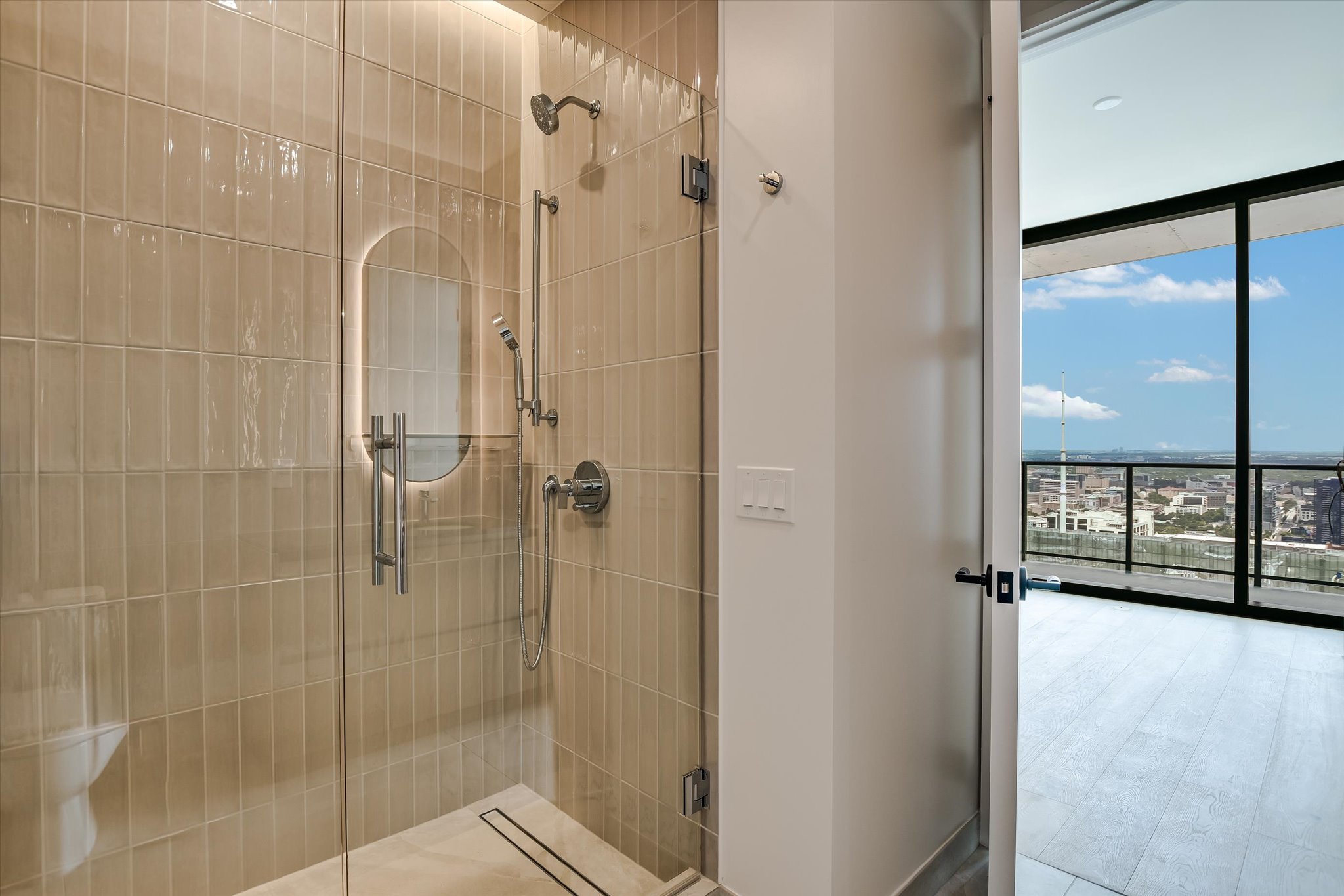 610 Davis Street, Unit 4704 Austin, TX 78701 - Photo 24 of 40 a bathroom with a shower