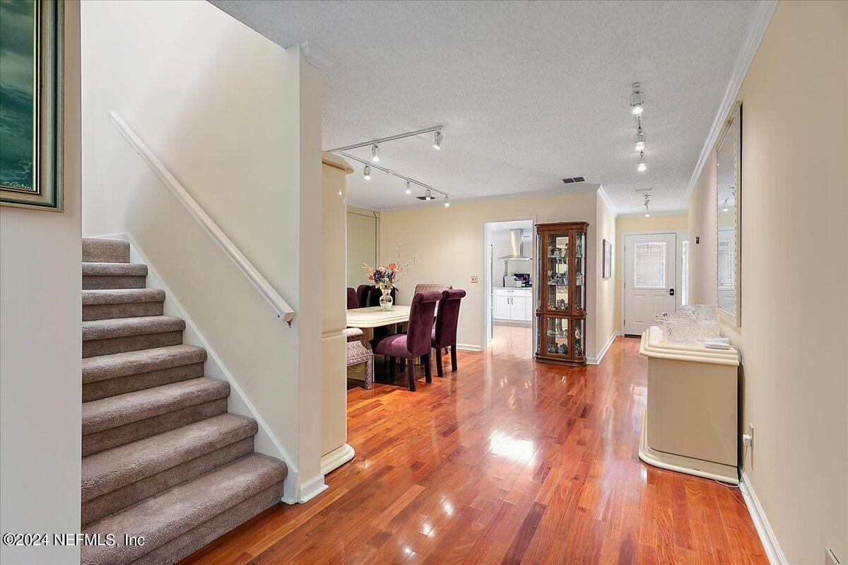 4251 Monument Road, Unit 202 Jacksonville, FL 32225 - Photo 16 of 35 16-Stairs to Dining