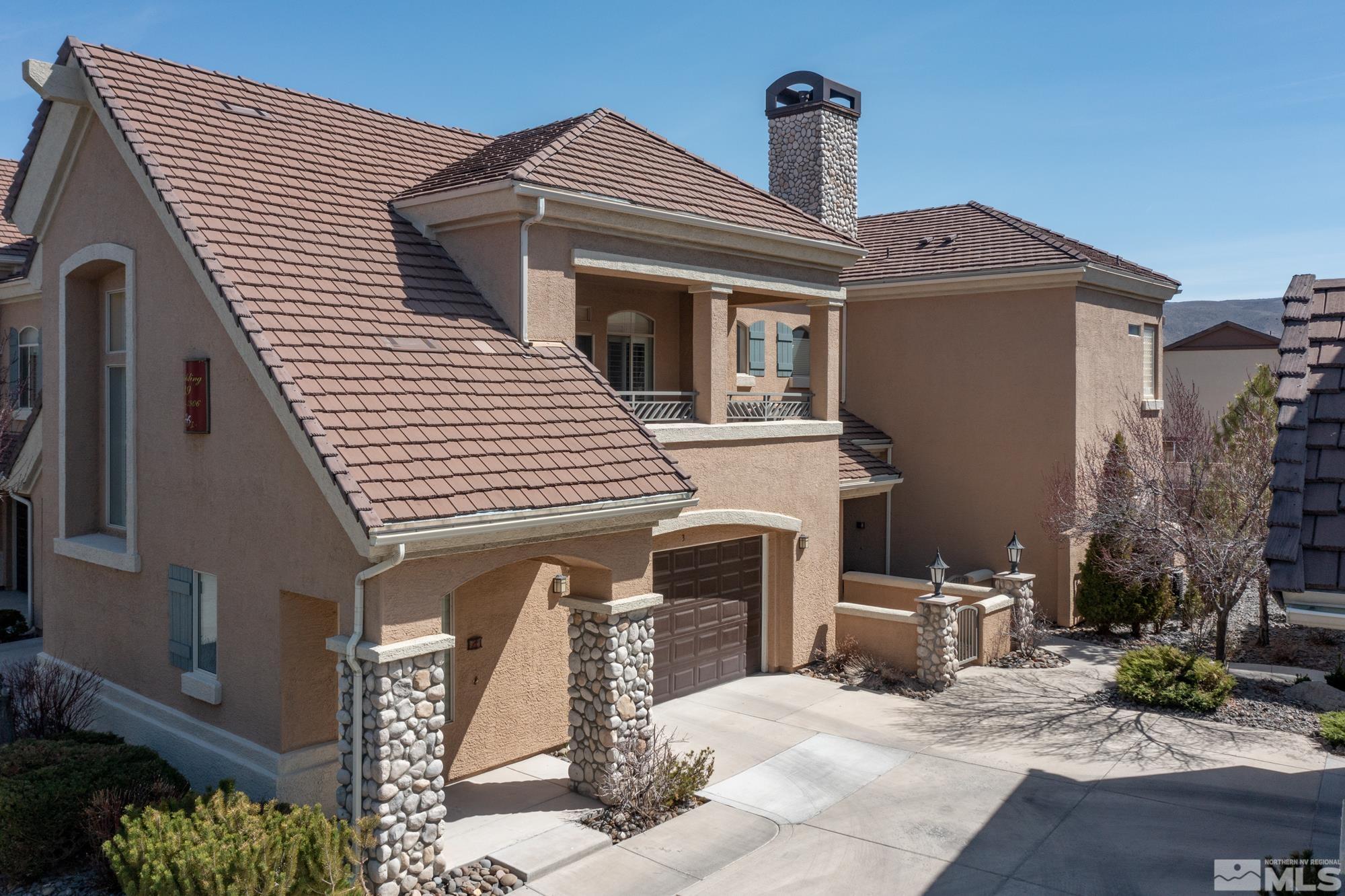 9900 Wilbur May, Unit 3902 Reno, NV 89521 - Photo 1 of 28 a front view of a house with garden