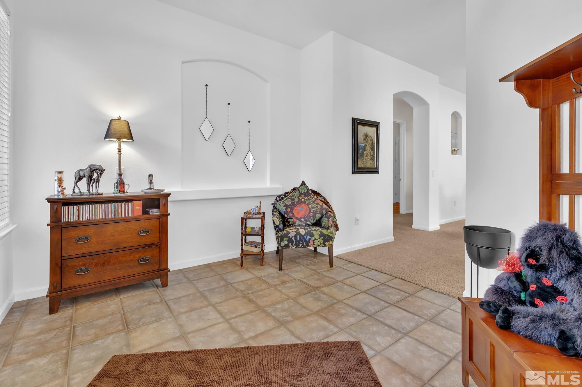 9900 Wilbur May, Unit 3902 Reno, NV 89521 - Photo 19 of 28 a living room with furniture