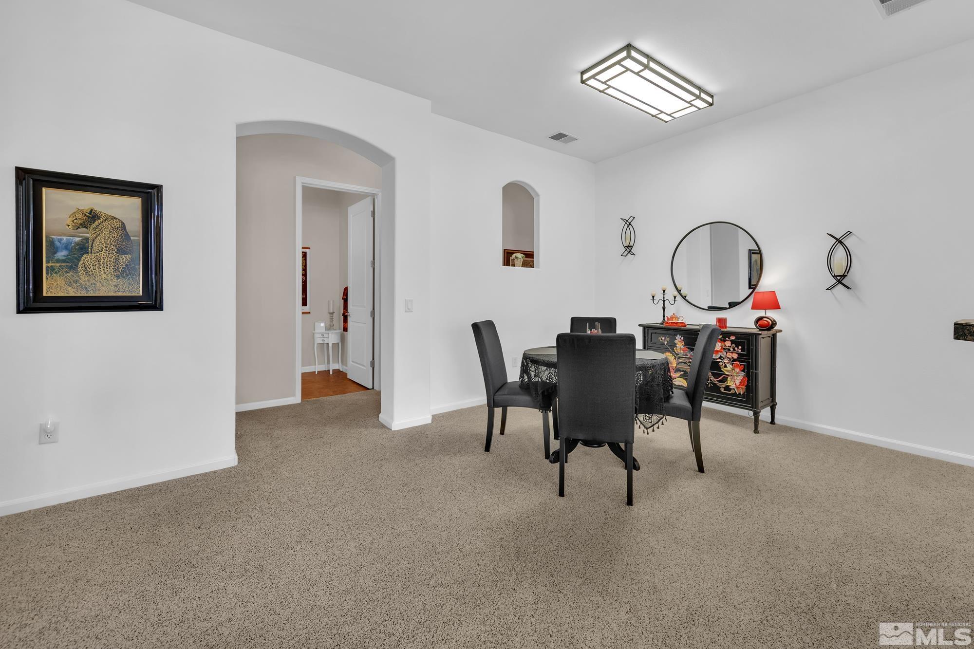 9900 Wilbur May, Unit 3902 Reno, NV 89521 - Photo 21 of 28 a view of a workspace with furniture and a window