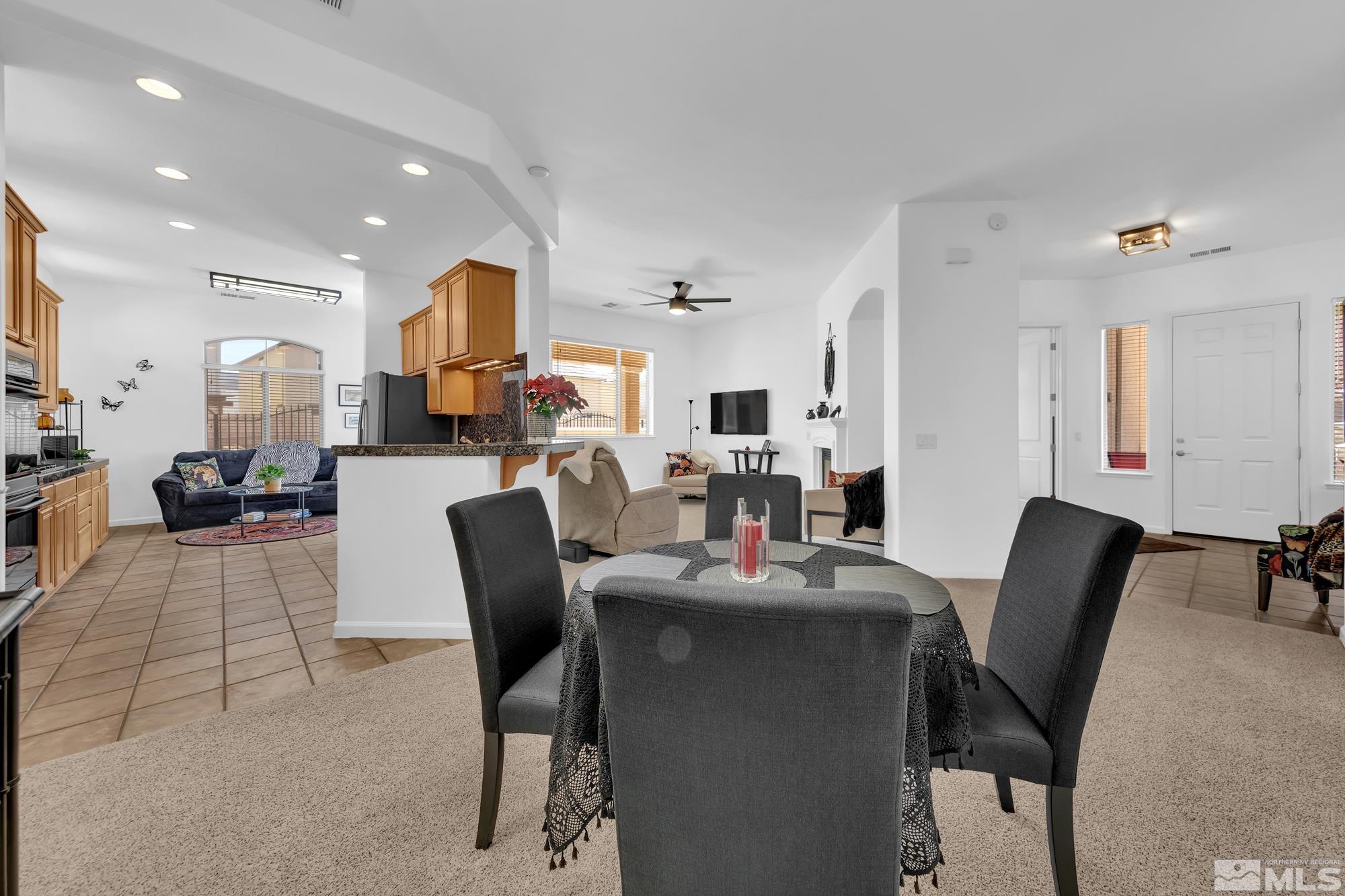 9900 Wilbur May, Unit 3902 Reno, NV 89521 - Photo 4 of 28 a dining room with furniture