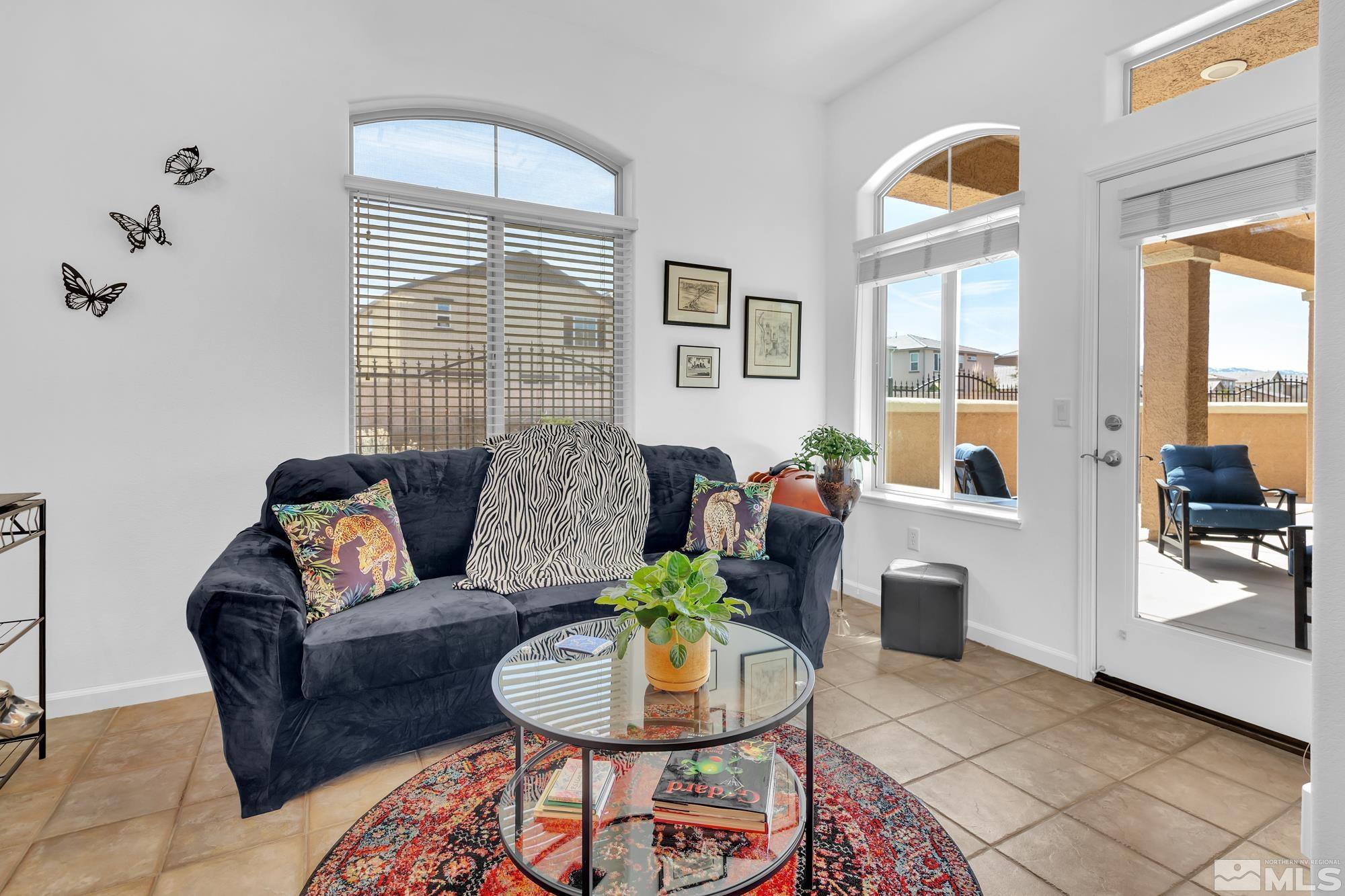 9900 Wilbur May, Unit 3902 Reno, NV 89521 - Photo 8 of 28 a living room with furniture and a large window