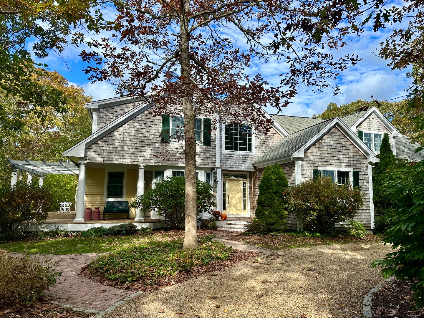 248 Pond Road West Tisbury, MA 02568 - Photo 1 of 34 a front view of a house with garden