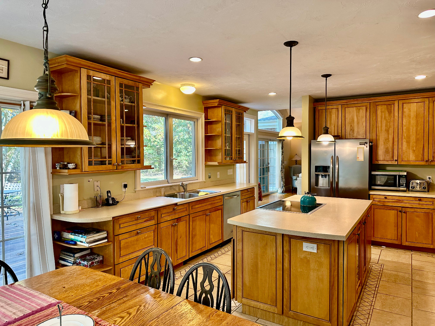 248 Pond Road West Tisbury, MA 02568 - Photo 12 of 34 a kitchen with stainless steel appliances a sink stove and a large window