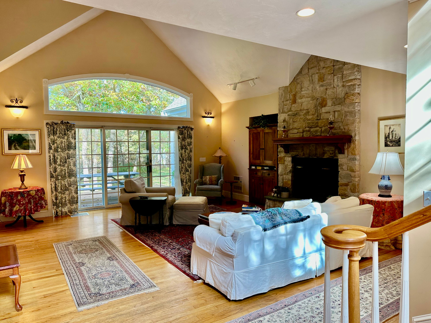 248 Pond Road West Tisbury, MA 02568 - Photo 15 of 34 a living room with fireplace furniture and a large window