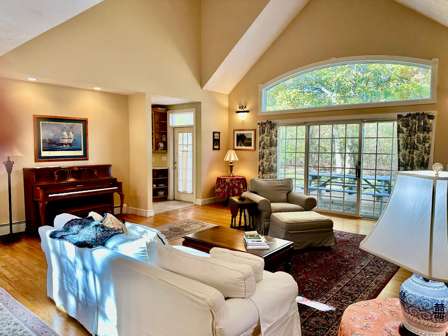 248 Pond Road West Tisbury, MA 02568 - Photo 16 of 34 a living room with furniture and a floor to ceiling window