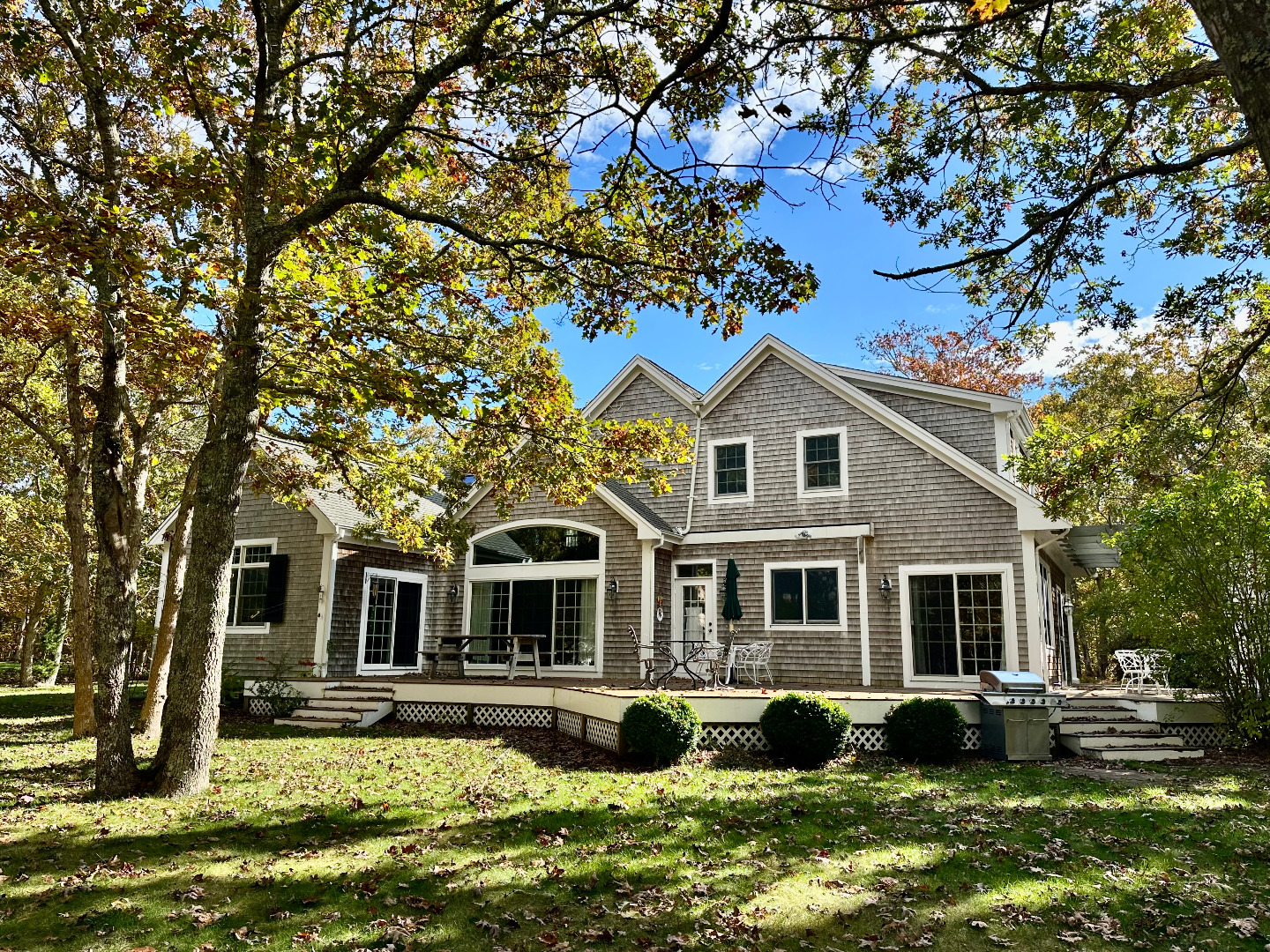 248 Pond Road West Tisbury, MA 02568 - Photo 33 of 34 a front view of a house with a yard