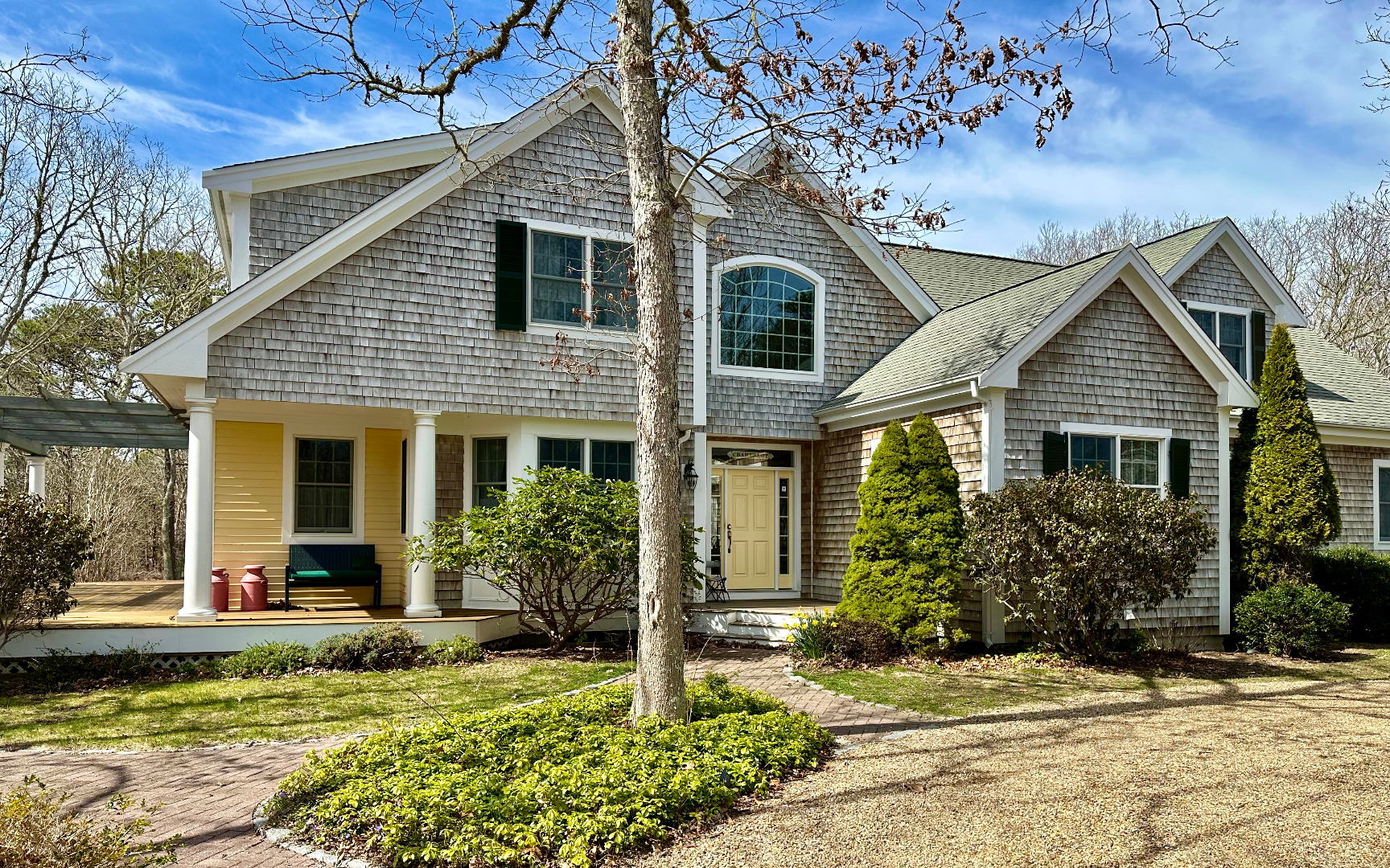 248 Pond Road West Tisbury, MA 02568 - Photo 34 of 34 a front view of a house with a yard