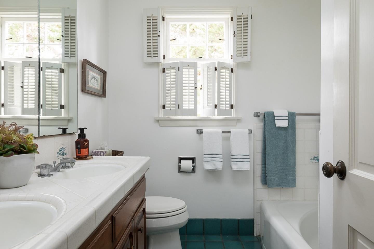 1508 Viscaino Road Pebble Beach, CA 93953 - Photo 20 of 23 a bathroom with a sink toilet and shower