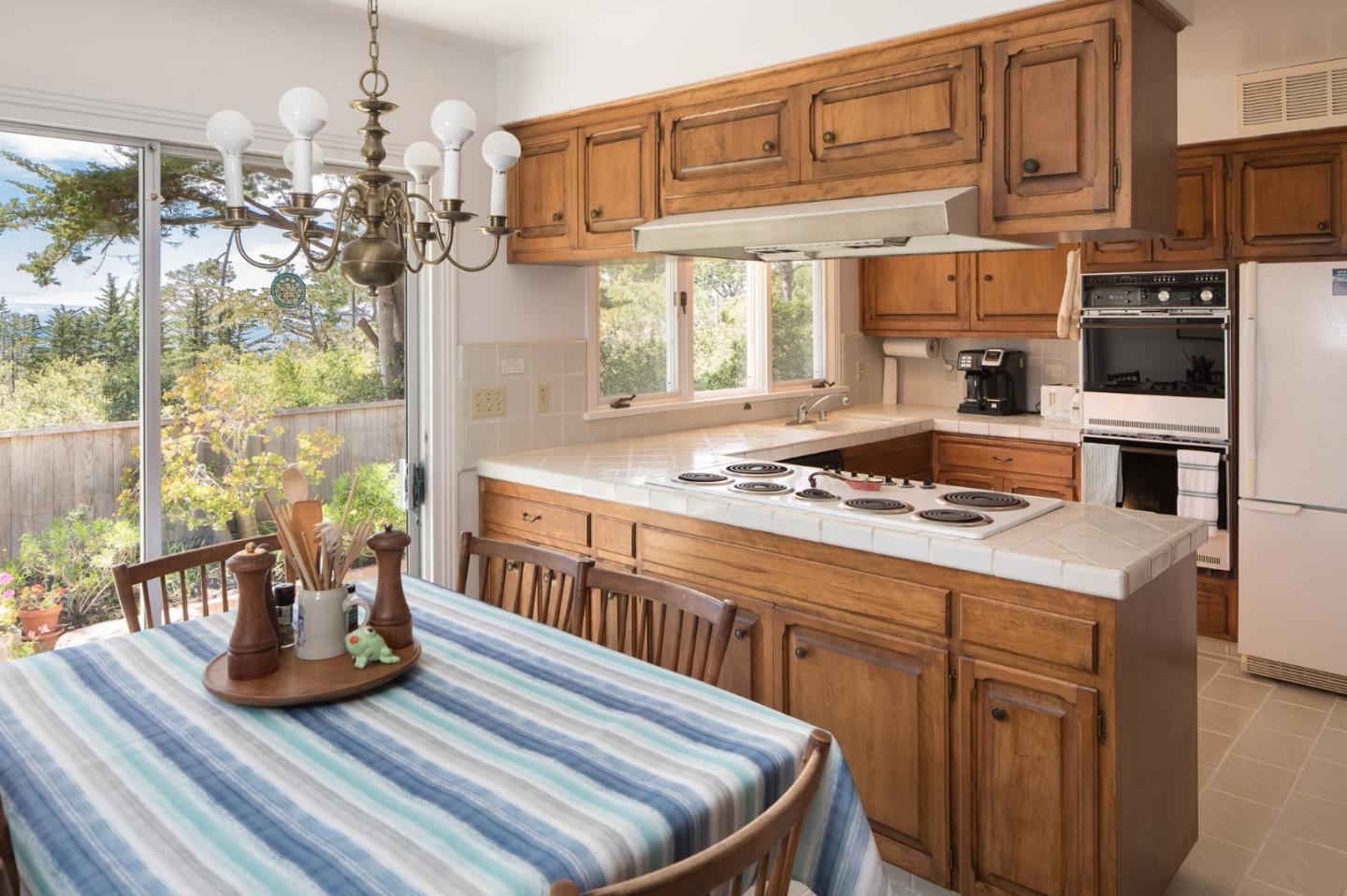 1508 Viscaino Road Pebble Beach, CA 93953 - Photo 4 of 23 a view of a dining room with furniture window and outside view