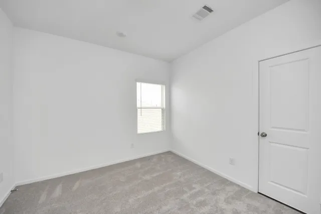a view of empty room with window
