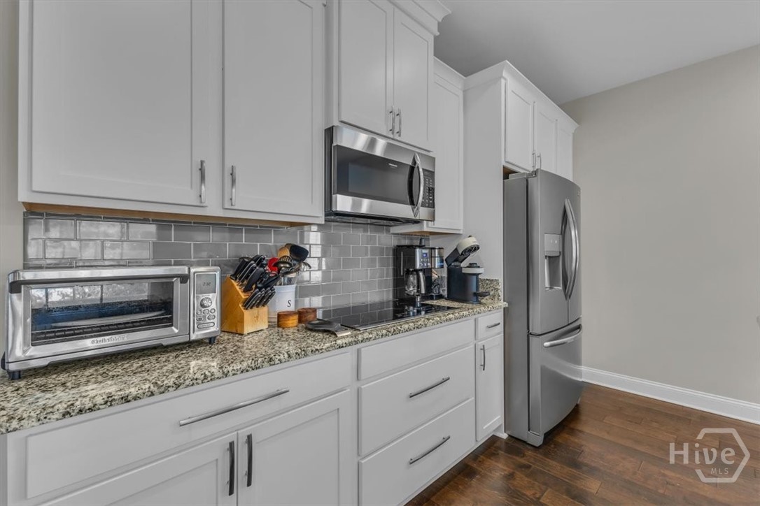 291 McQueen Drive Pooler, GA 31322 - Photo 15 of 57 A CHEF'S DREAM KITCHEN WITH 42' CUSTOM CABINETS