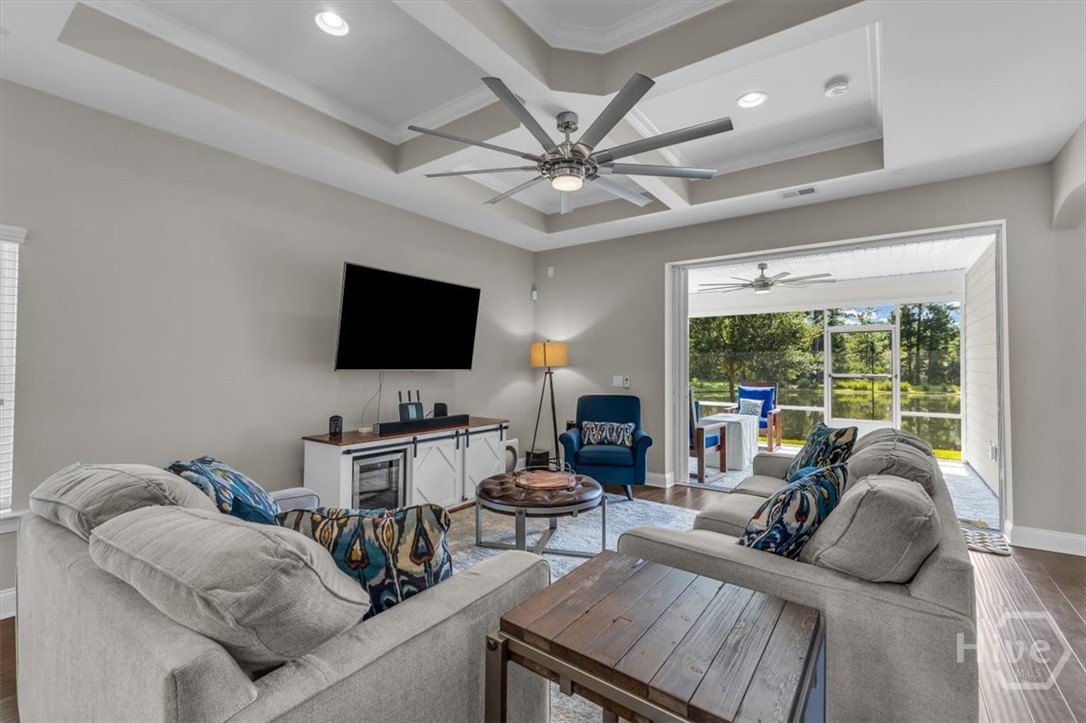 291 McQueen Drive Pooler, GA 31322 - Photo 22 of 57 SLIDE DOOR THAT OPENS COMPLETELY TO THE BACKPORCH THAT'S PERFECT FOR INDOOR/OUTDOOR ENTERTAINMENT FROM THE KITCHEM