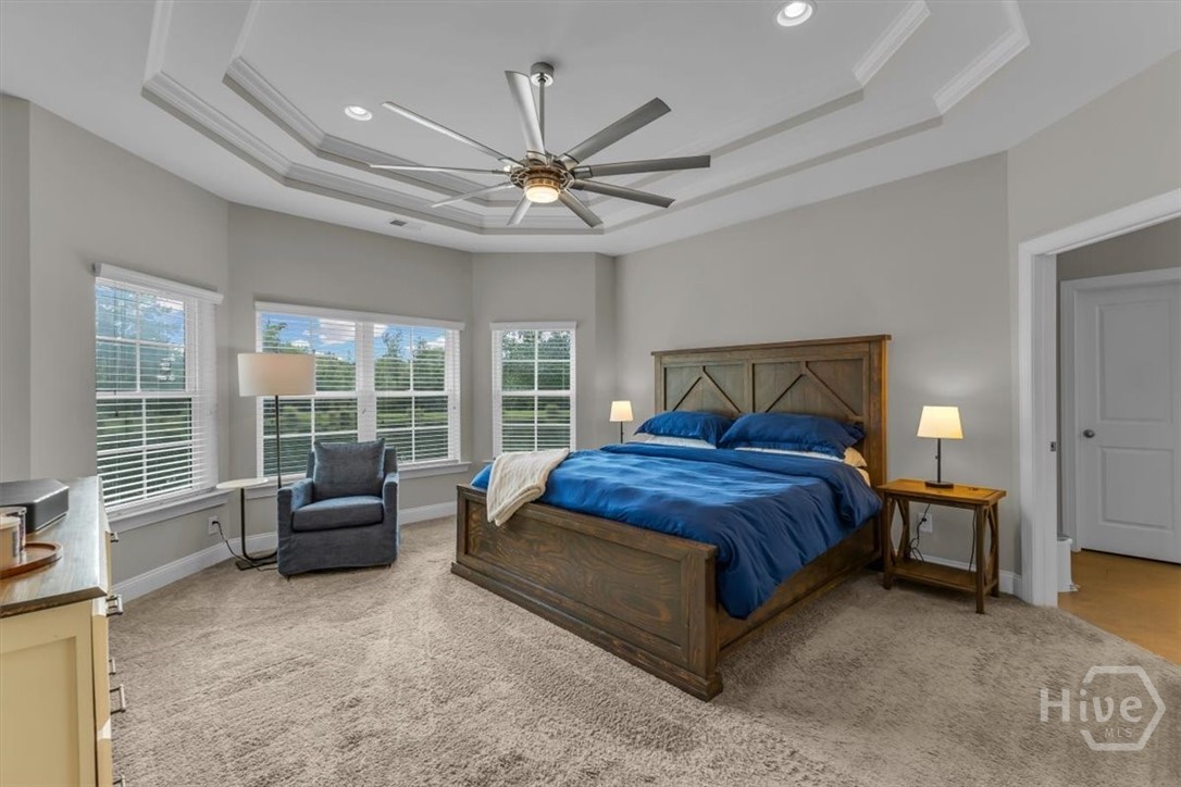 291 McQueen Drive Pooler, GA 31322 - Photo 25 of 57 AN OVERSIZED OWNER'S SUITE WITH A NICE BAY WINDOW THAT PROVIDE LOTS OF NATURAL LIGHT AND DOUBLE TREY CEILING WITH CROWN MOLDING