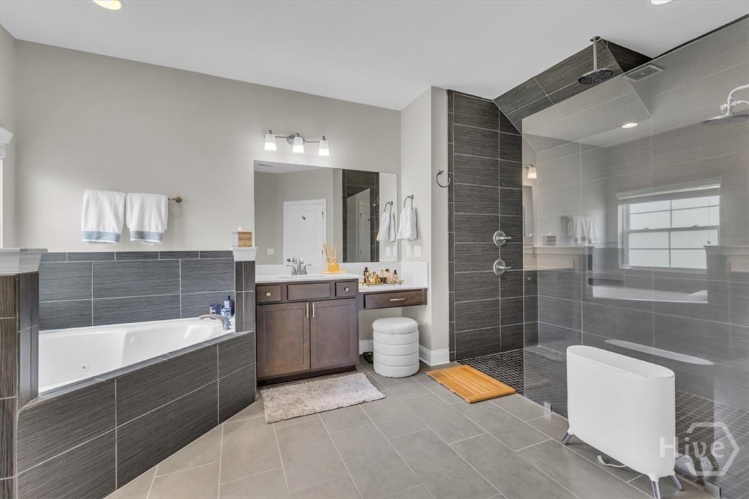 291 McQueen Drive Pooler, GA 31322 - Photo 28 of 57 LUXURY ENSUITE OWNER'S BATH WITH MAKE-UP VANITY AREA AND 2ND SINK