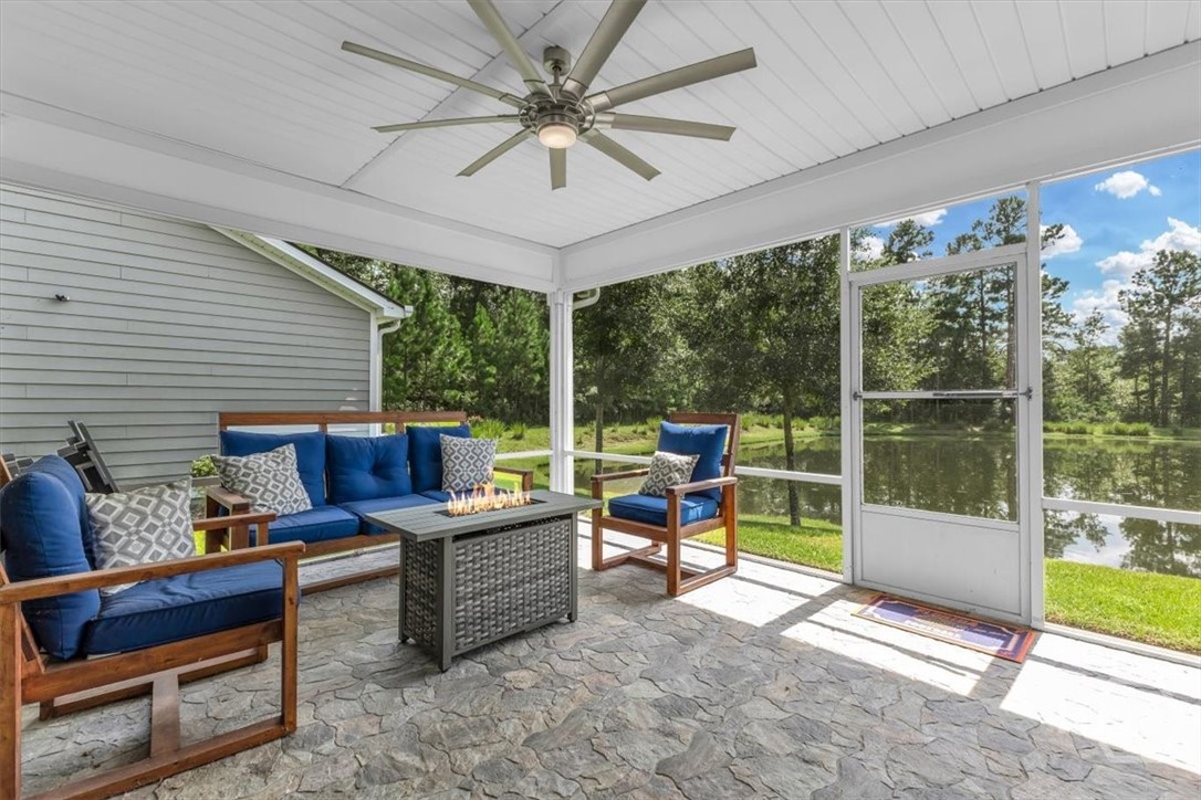 291 McQueen Drive Pooler, GA 31322 - Photo 45 of 57 SCREENED PORCHED WITH STONE FLOORS AND LARGE CEILING FAN