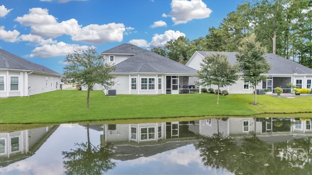 291 McQueen Drive Pooler, GA 31322 - Photo 49 of 57 REAR VIEW FROM ACROSS THE LAKE