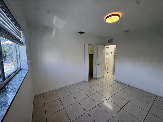 a view of a livingroom with a flat screen tv