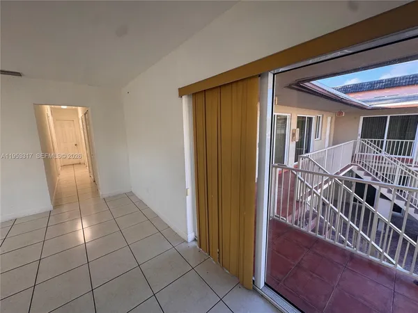 a view of an entryway with a livingroom